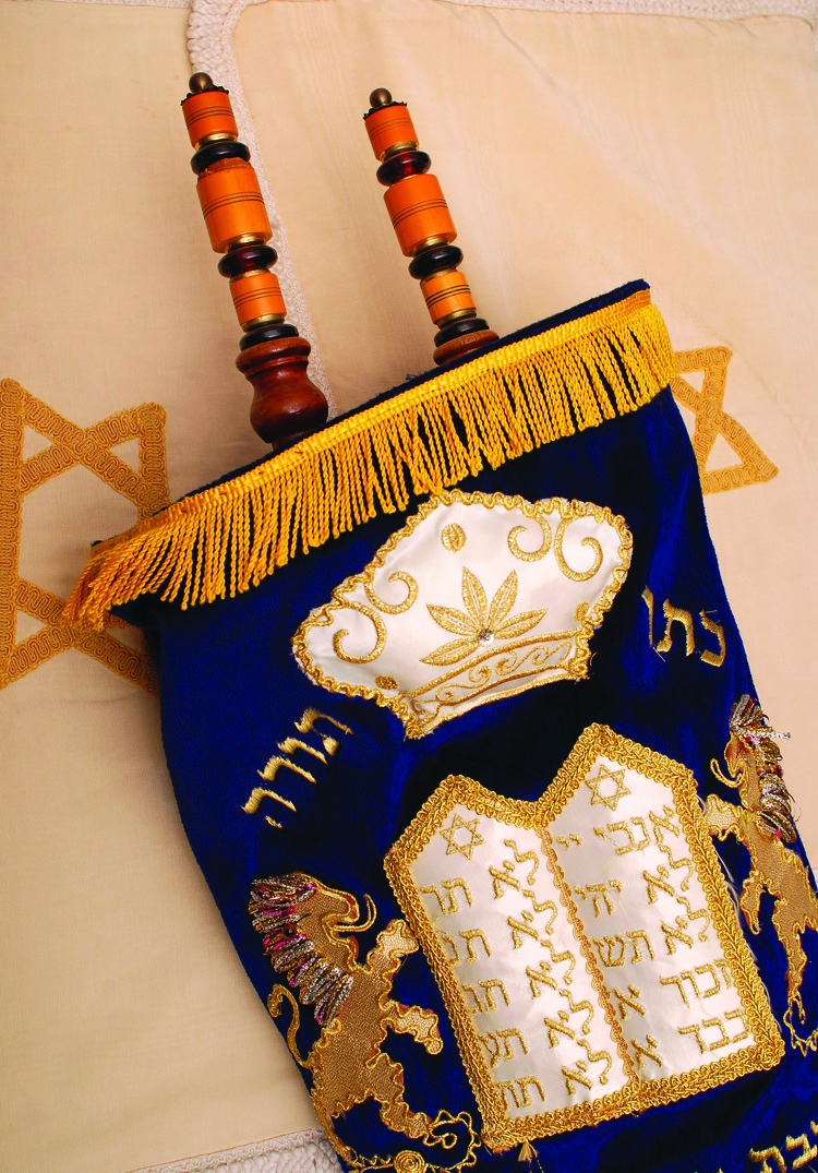 Jewish torah scroll in cover