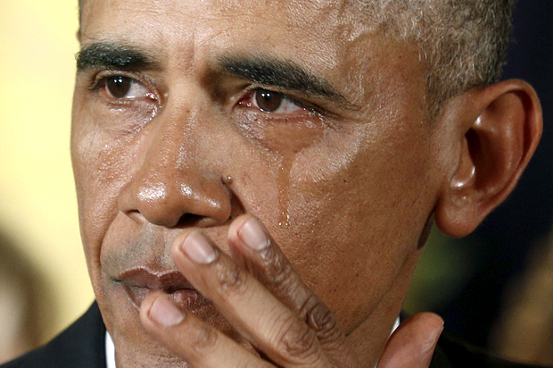 U.S. President Obama wipes a tear while talking about Newtown and other mass killings during an event held to announce new gun control measures at the White House in Washington